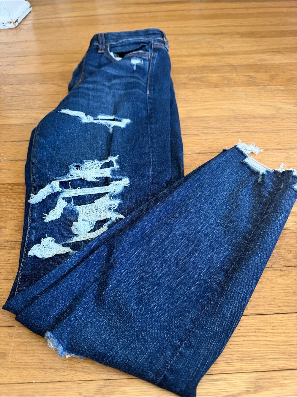 American Eagle Sz 10 Dark Blue Distressed Women’s Jeans hi-rise jegging raw hem